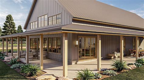 metal house with wrap around porch|barndominium with large covered porch.